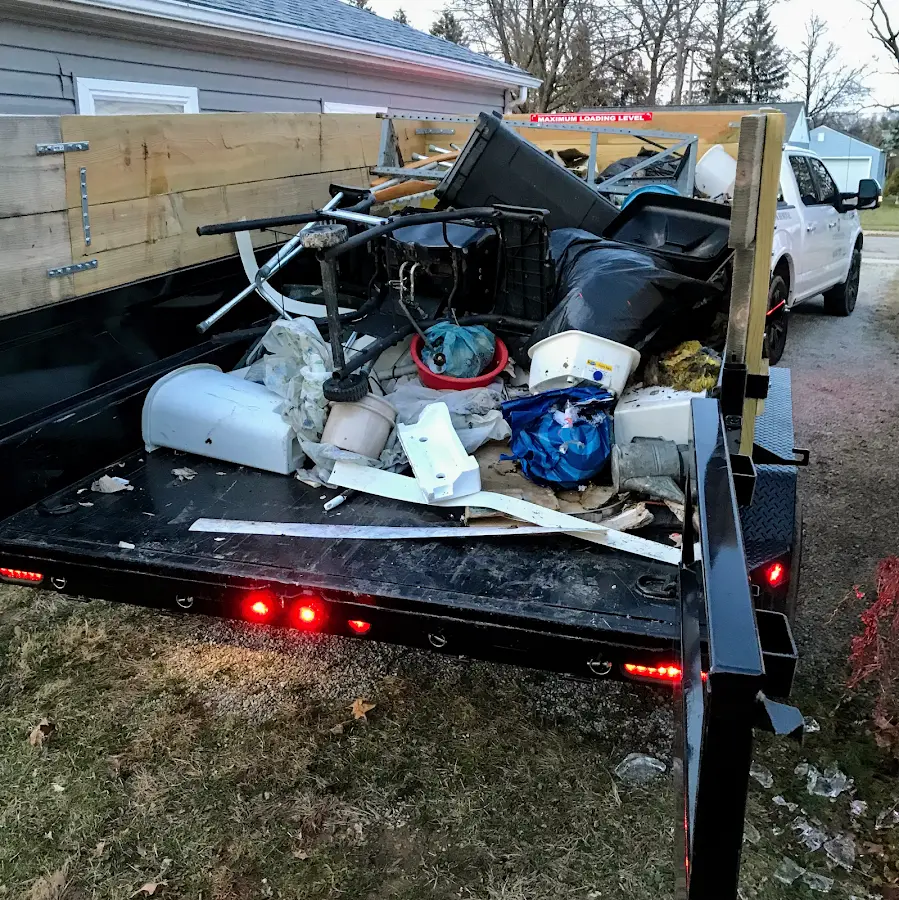 Roll-off dumpster delivered to a residential driveway in Somerville